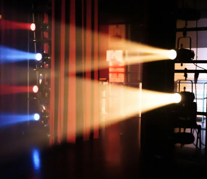 red and yellow light on a dark room